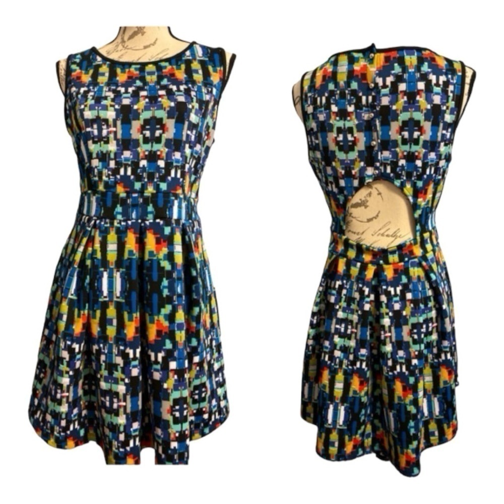 Romeo and Juliet Couture dress.Multi colored. Cut out in back. Never worn.